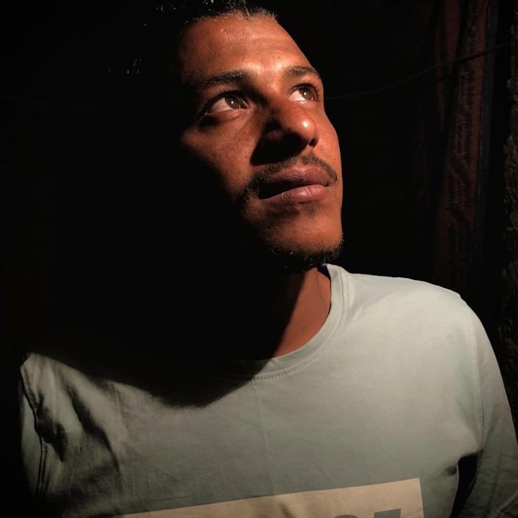 Asha Rao, Lead Design Curator at Simple Track Space, reviewing corporate floral arrangements